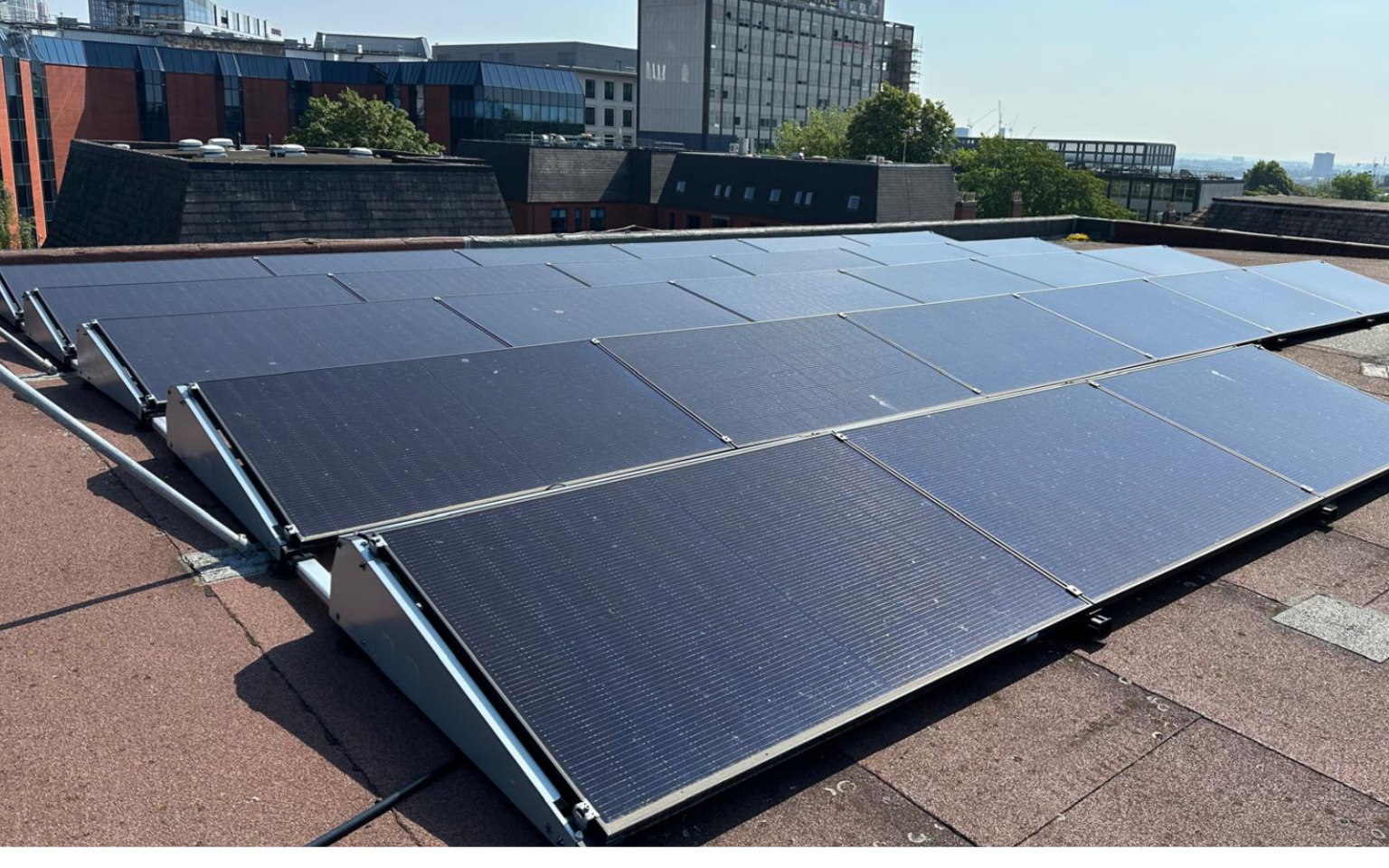 Solar panels in the middle of VIQU's roof highlighting exciting strides forward in VIQU's green journey.